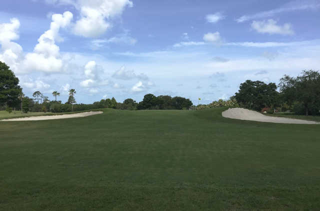 A view of a green flanked by bunkers at Clearwater Country Club.