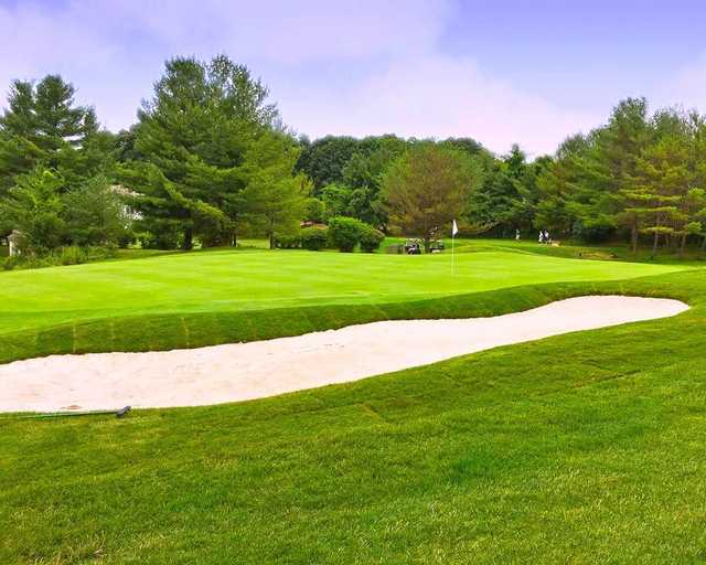 A view of a hole protected by a tricky bunker at Somers National Golf Club.