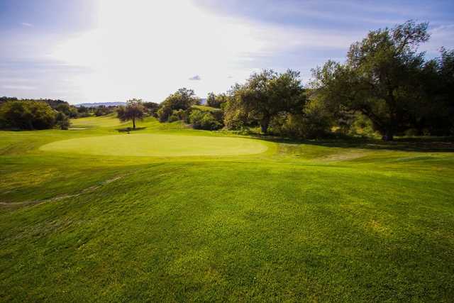 A sunny day view o a hole at CrossCreek Golf Club.