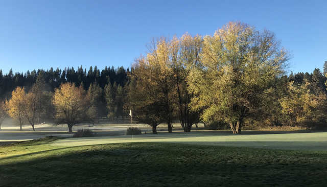 A fall day view of a green at Mace Meadow Golf & Country Club.