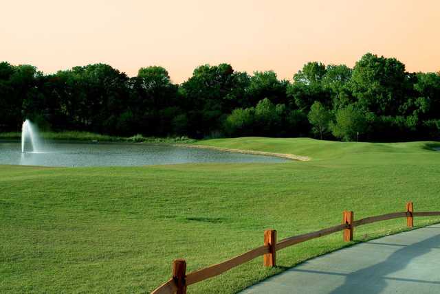 A view over a fence at Heritage Ranch Golf and Country Club.