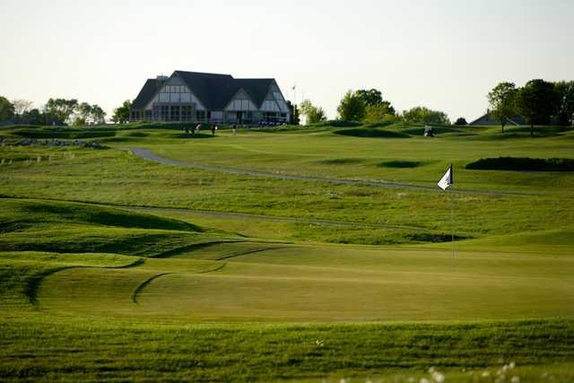 A view of a hole and the clubhouse in the distance at Washington County Golf Course.