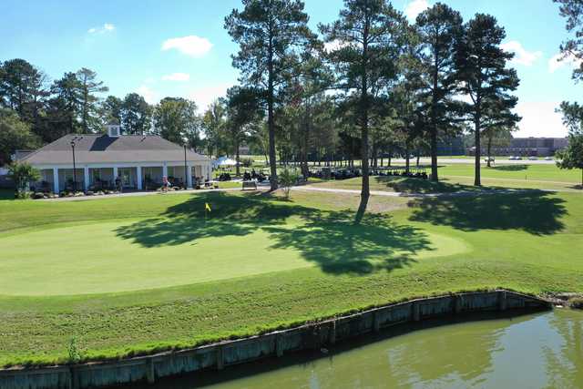 A view of a green with water coming into play at Dogwood Trace Golf Course.