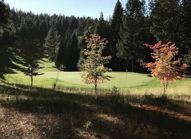 A fall day view of a green at Apple Mountain Golf Resort.