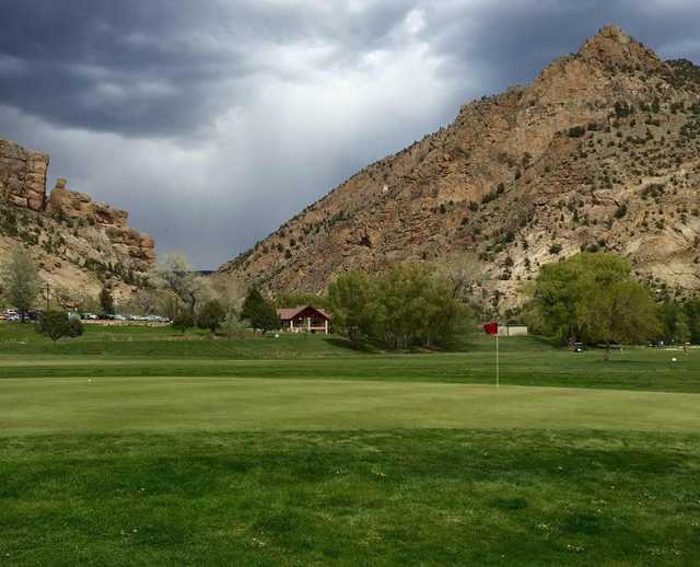 A cloudy day view of a hole at Rifle Creek Golf Course.