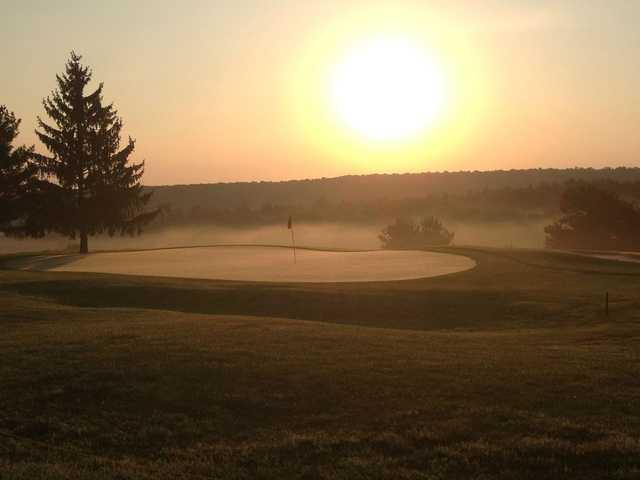 A sunny day view of a hole at North Hills Golf Course.