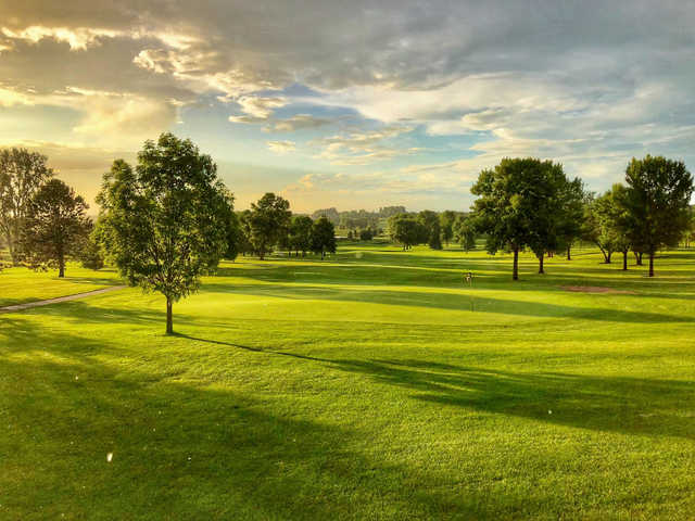 A sunset view of a green at Montgomery National Golf Club.