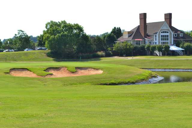 A view of the clubhouse and a green at Brickshire Golf Club.