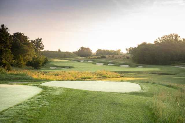 A view of a fairway with bunkers on both sides at Creekmoor Golf Club.