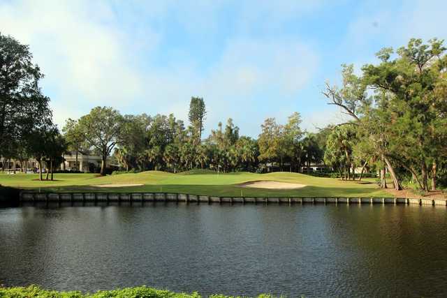 A view of a hole with water and bunkers coming into play at Boca Royale Golf & Country Club.