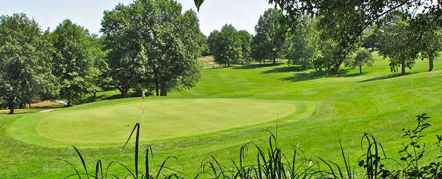 A sunny day view of a green at Hillcrest Golf & Country Club.