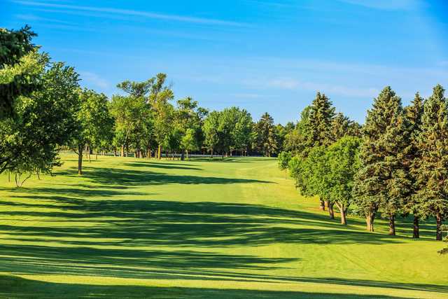 A sunny day view from a fairway at Brookings Country Club.