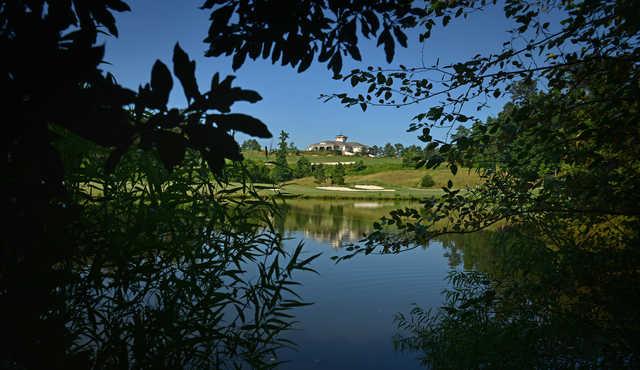 A view over the water of the clubhouse from Lonnie Poole Golf Course at North Carolina State University.