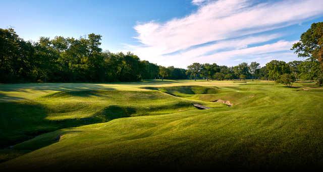 A sunny day view of a fairway at Shoreacres.