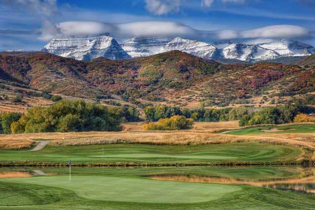 A fall day view of two greens at Soldier Hollow Golf Course.