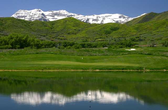 A view over the water of a hole at Soldier Hollow Golf Course.