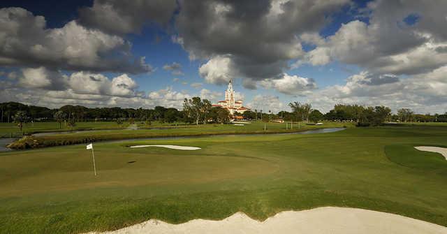 A view of a green with water and bunkers coming into play at Biltmore Golf Course.