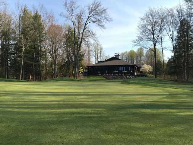 A spring day view of a green at The Ravines Golf Club.