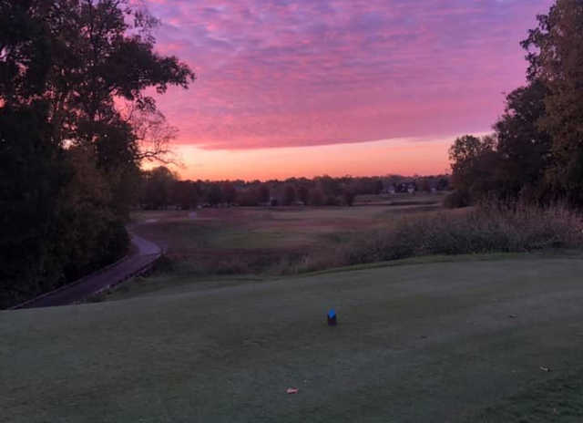 A sunset view of a tee at Walden Ponds Golf Club.