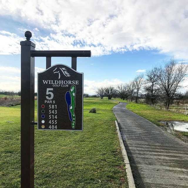 A view from tee #5 sign at Wildhorse Golf Course.