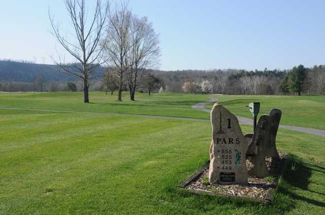 A view from tee #1 sign at Sunset Golf Club.