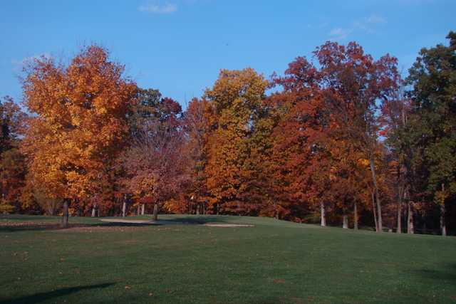 A view of a green protected by bunkers at Bent Tree Golf Course.