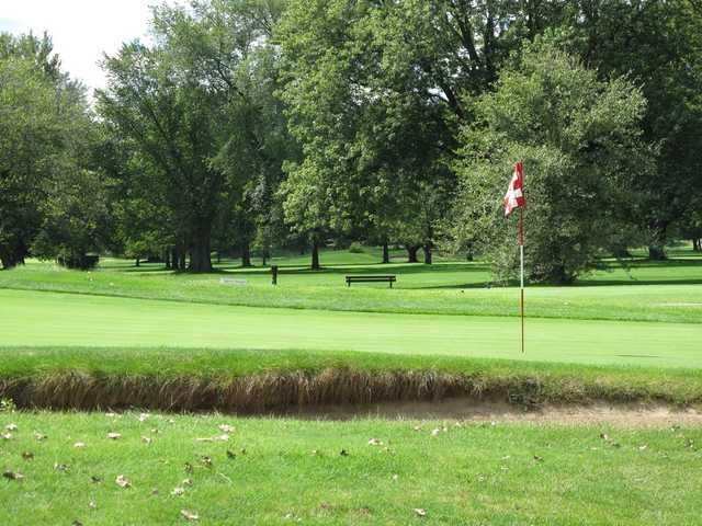 A sunny day view of a hole at Winnetka Golf Club.