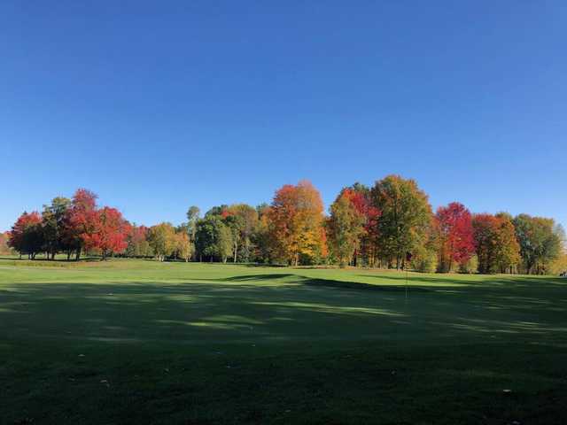 A sunny day view of a green at Upper Canada Golf Course.