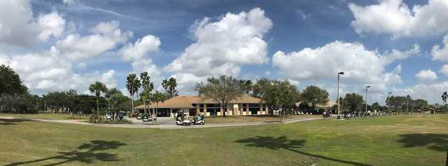 Panoramic view of the clubhouse and driving range at Stoneybrook Golf Club.