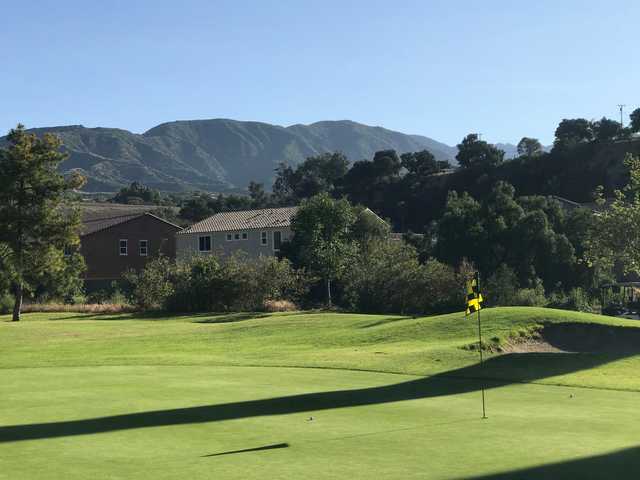 A sunny day view of a hole at San Dimas Canyon Golf Course.