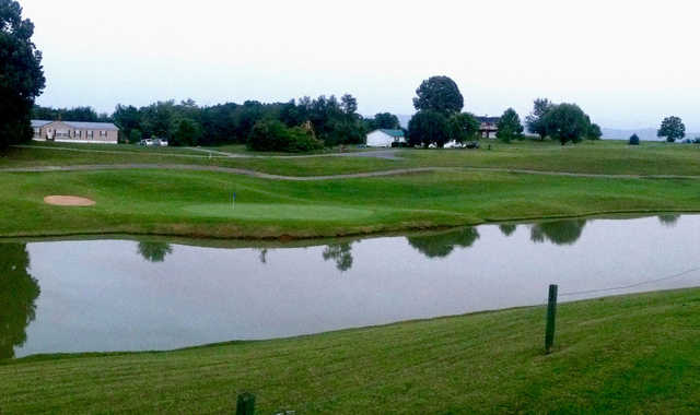 A view of a green with water coming into play at Dandridge Golf & Country Club.