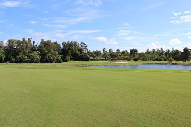 A view of a hole with water and bunkers coming into play at San Carlos Golf Club.