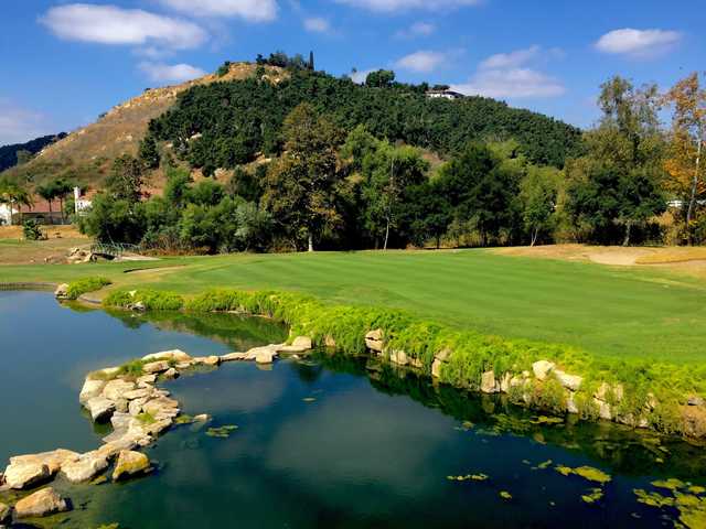 A sunny day view of a green at Eagle Crest Golf Club.