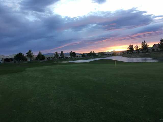 A sunset view of a hole at Ashwood Golf Club.