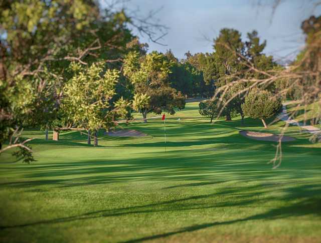 A view of two holes at Los Serranos Golf & Country Club.