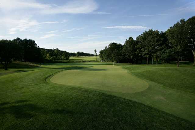 Looking back from a green at The Golf Club at Thornapple Pointe