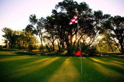 A sunny day view of a hole at Spring Valley Golf Course 