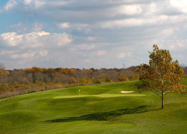 A fall day view of a green at Gibson Bay Golf Course.