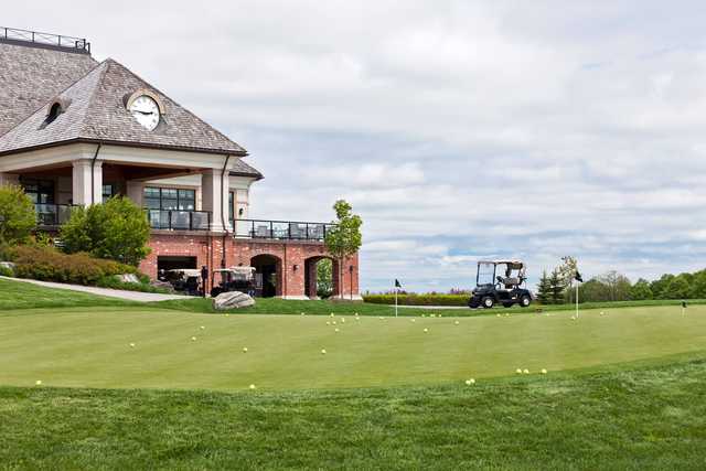 A view of the practice putting green and the clubhouse at the Club at Bond Head.