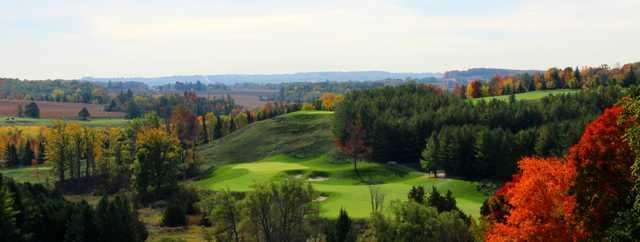 A fall day view of a green from the Club at Bond Head.