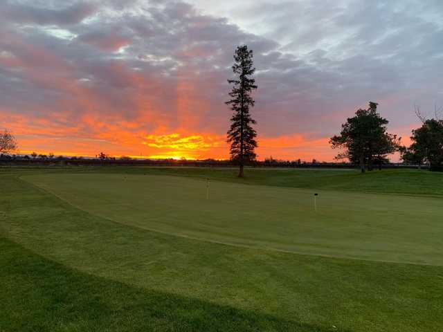 A sunset view of the practice putting green at Micke Grove Golf Links.