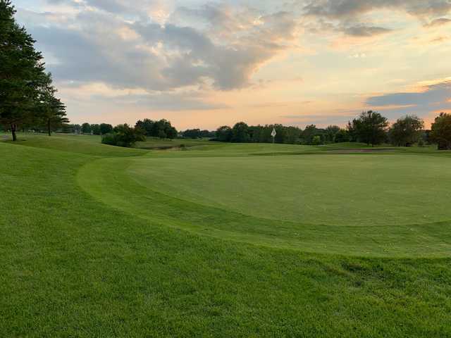 A sunset view of a hole at Crystal Lake Golf Club.