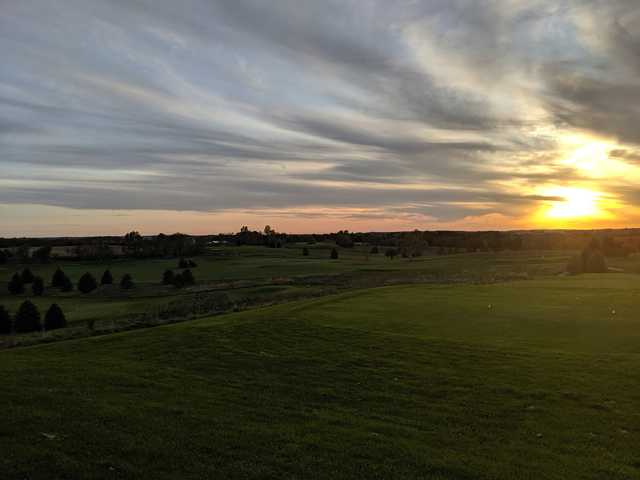 A sunset view of a tee at Gopher Hills Golf Course.