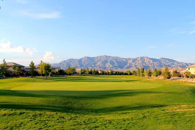 A sunny day view of a green at Aliante Golf Course.