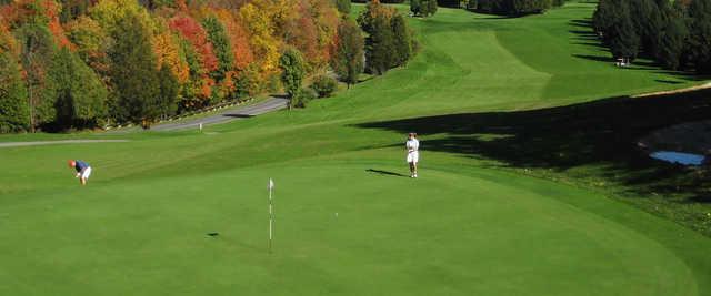 A fall day view of a green at Montgomery Bell State Park Golf Course.