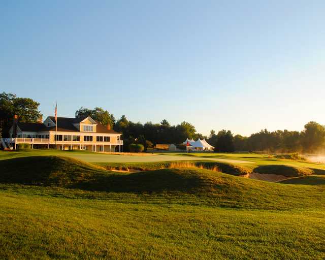 A view of the clubhouse and a well protected green at Falmouth Country Club.