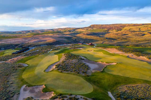 View of the 1st tee on the left and the 18th green and clubhouse on the right side at Gamble Sands Golf Club.