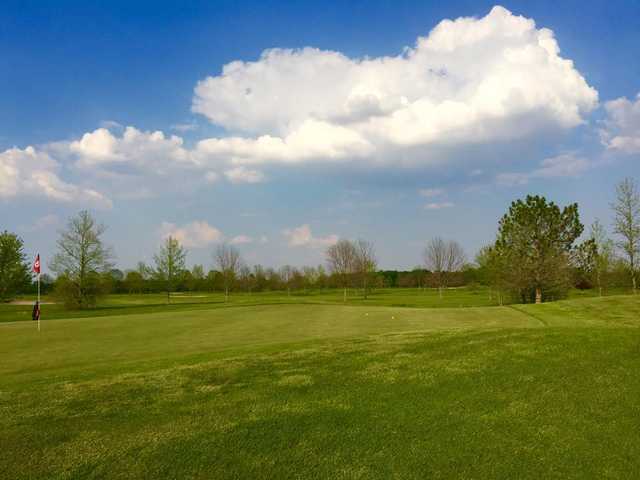 A spring day view of a green at Deer Creek State Park Golf Course.
