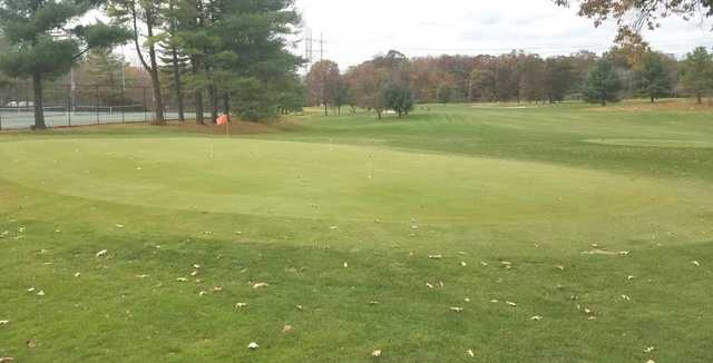 A view of the practice putting green and a tee at Jefferson District Golf Course.