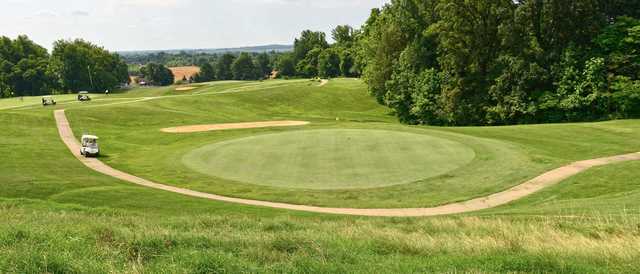 A view of a manicured green at John James Audubon Golf Course.